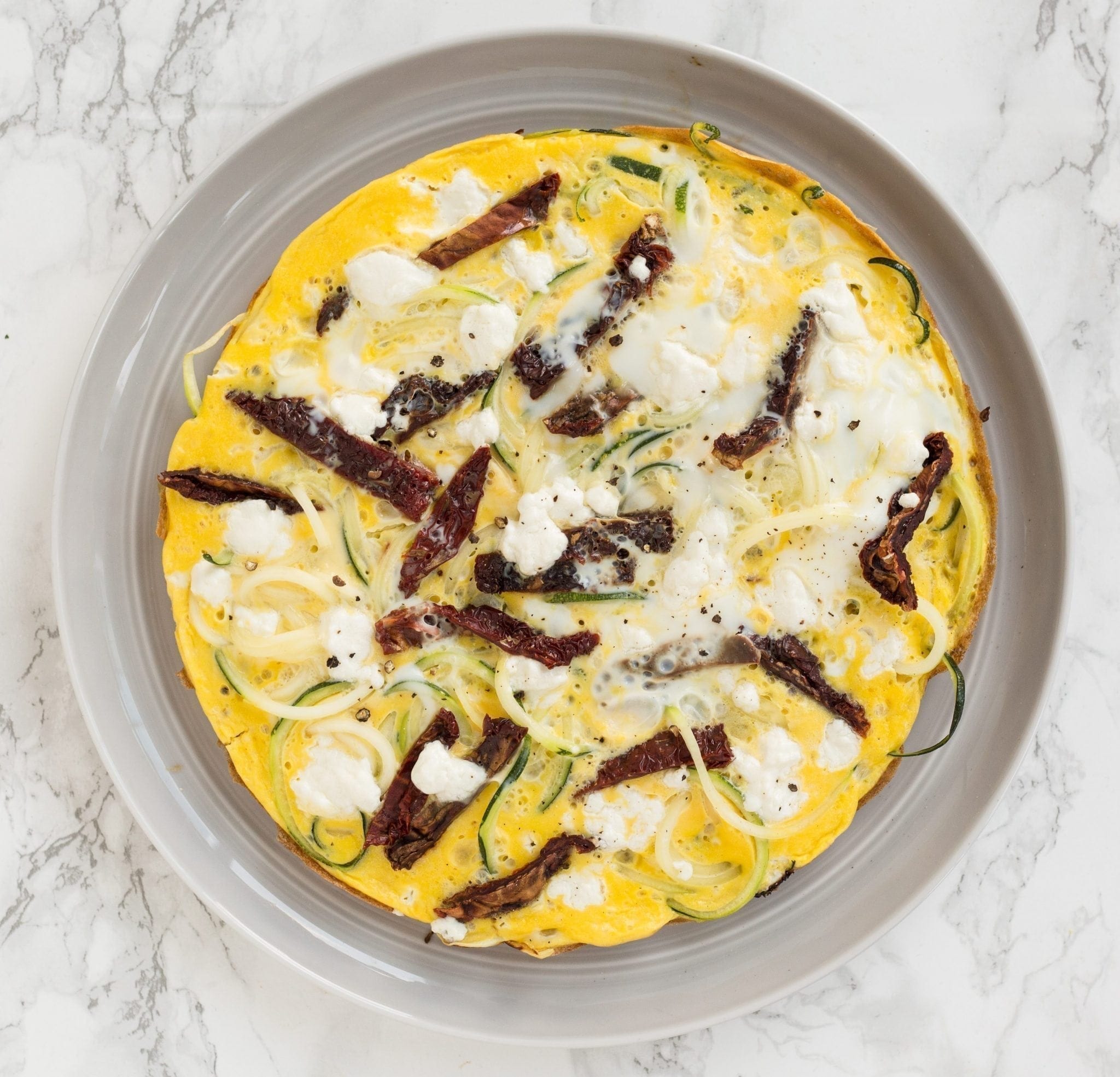 Zucchini Noodle Frittata with Goat Cheese and Sun-Dried Tomatoes