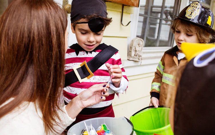 10 Tricks to Keeping Kids from Eating Too Many Halloween Treats