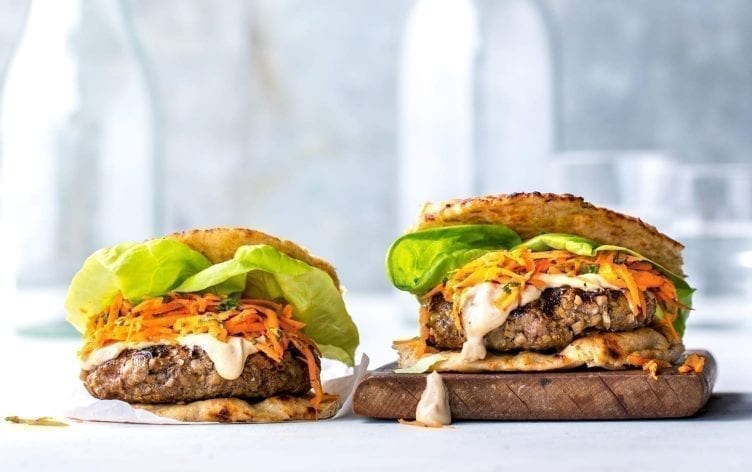 Spicy Burgers With Tahini Sauce and Harissa Carrot Slaw