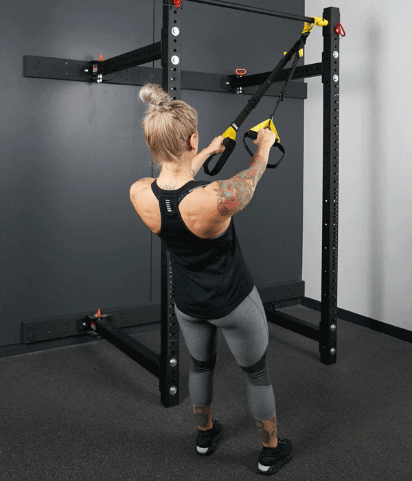Trx workouts with female athlete